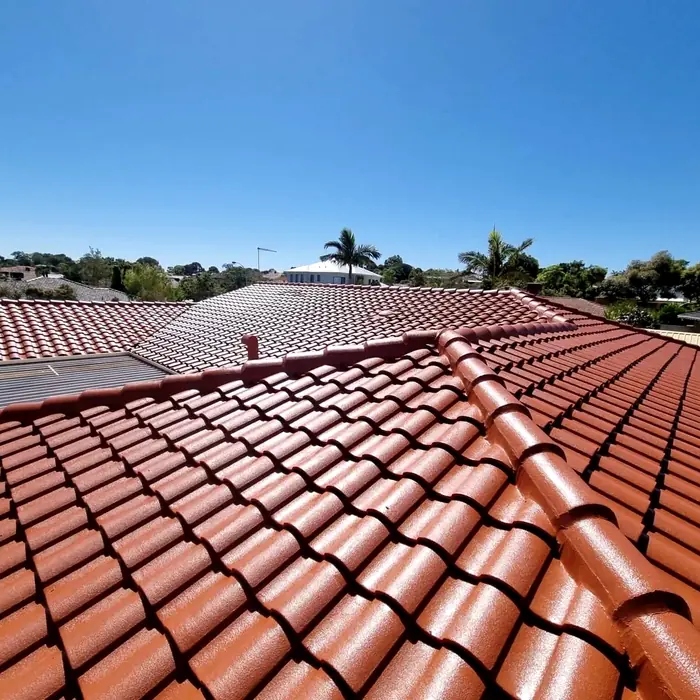 Restored terracotta tile roof by Kili and Cousins